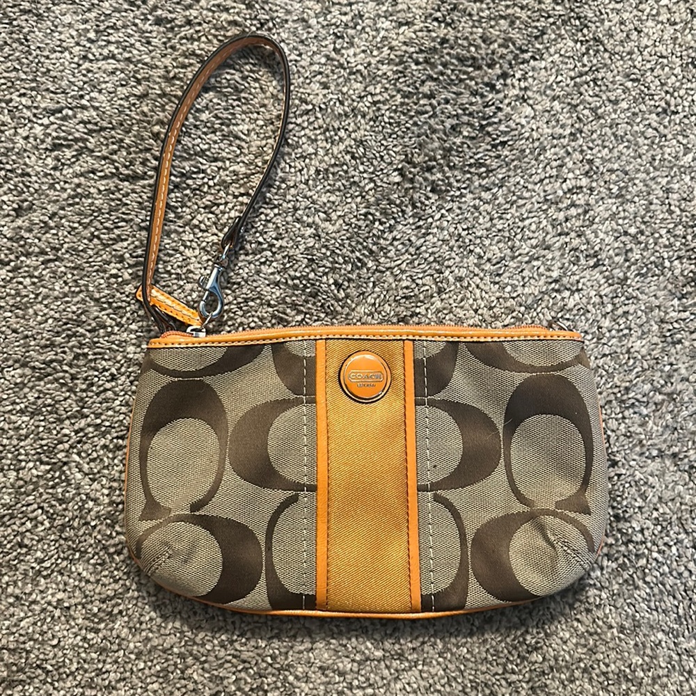 Oversized Coach wristlet